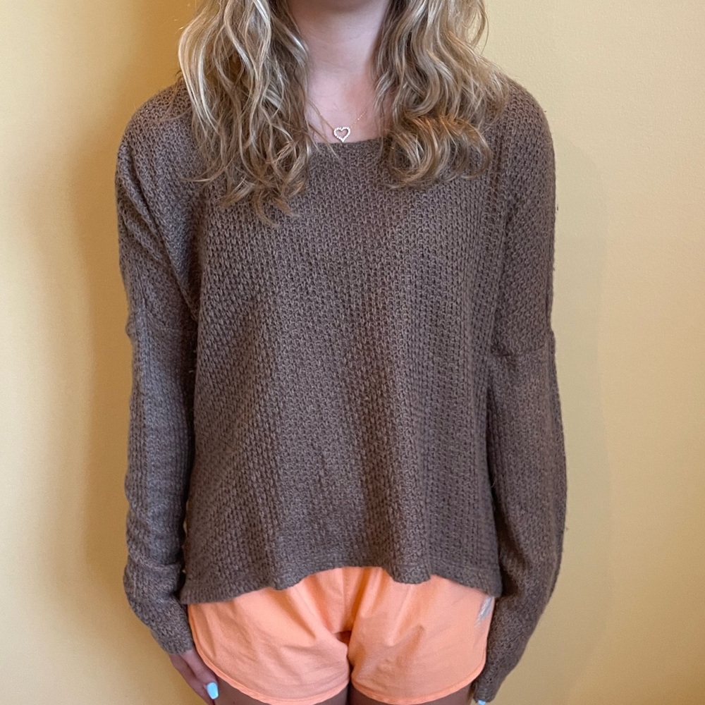 This is a Jack medium brown oversized sweater.